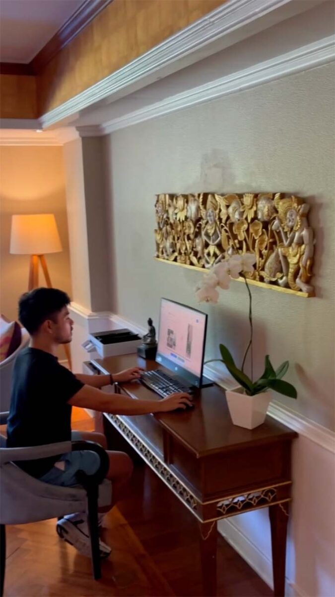 Building a website at a hotel desk